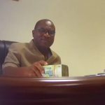 Robert Sarfo-Mensah being given the bribe at his office by Tiger Eye PI team