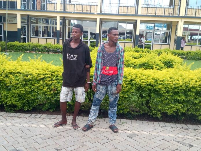 The two suspects at the regional command