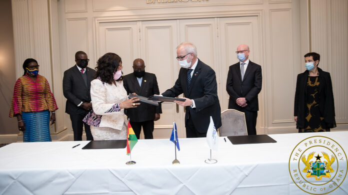 Hon. Shirley Ayorkor Botchwey and Dr Werner Hoyer, President of the European Investment Bank exchanging copies of the signed agreement