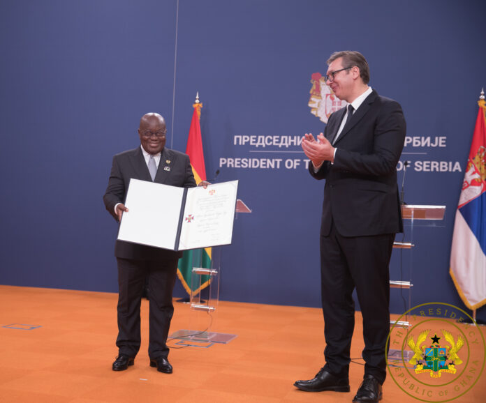President Akufo-Addo receives the citation from the Serbian President