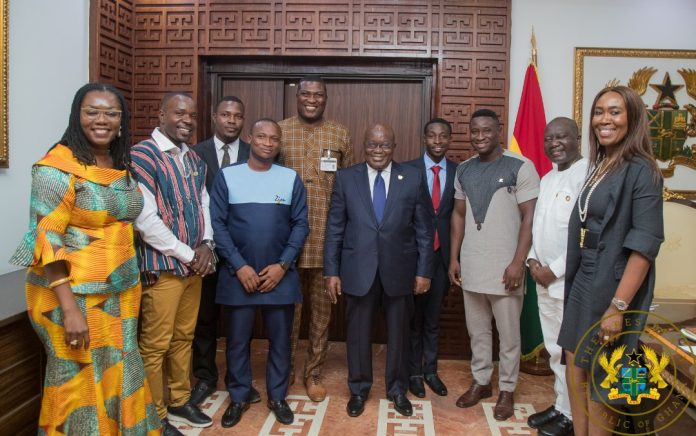 Members of the Mobile Money Agents Association of Ghana (MMAG) with President Nana Akufo-Addo