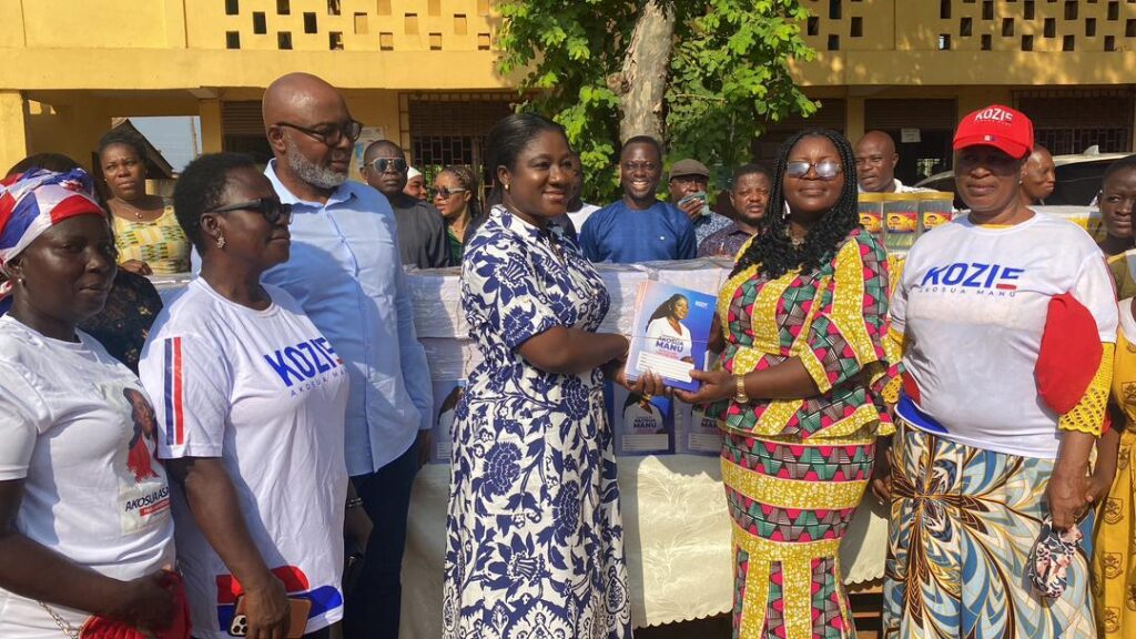 Akosua Manu, affectionately called Kozie, presenting the learning materials in her constituency.